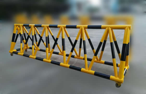 Yellow and black powder painted steel barricade panels